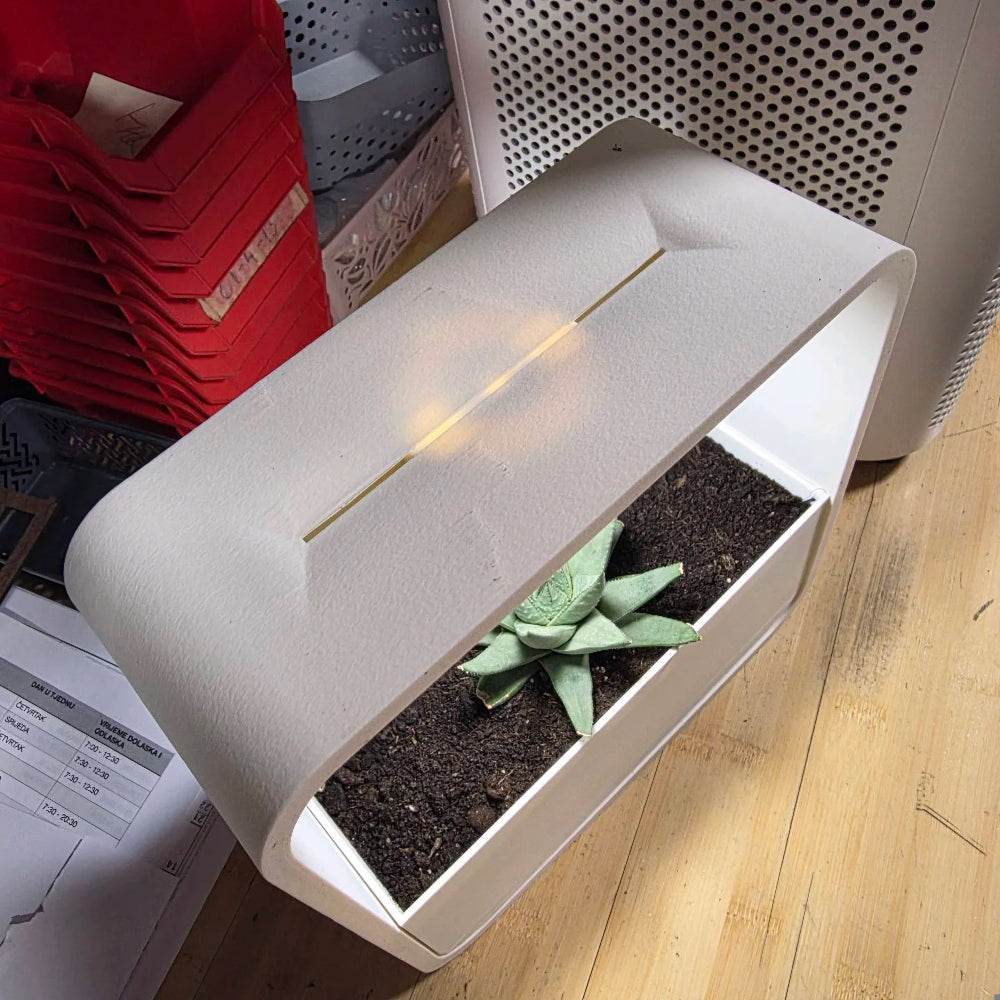 Ambient RGB LED lamp and drip tray planter designed for a clean, mess-free setup.